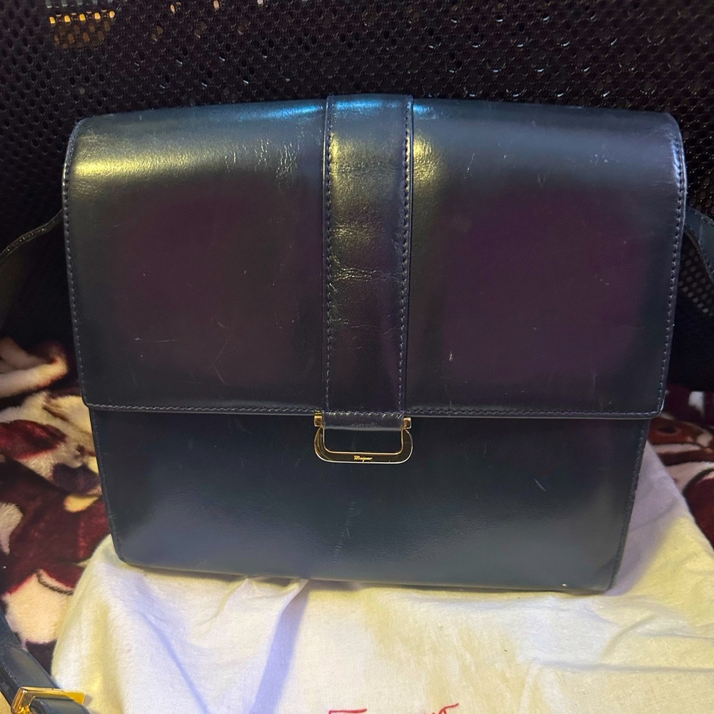 Salvatore Ferragamo black crossbody. In EUC. Comes with dust bag.